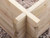 the corner of an easy assemble raised bed in construction