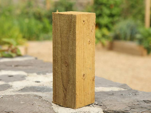 chunky timber corner posts for raised beds