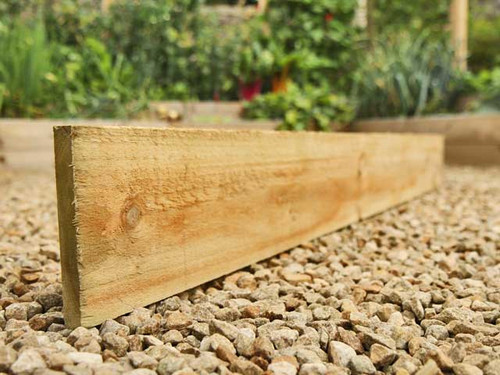 Mowing strip boards fruit cage