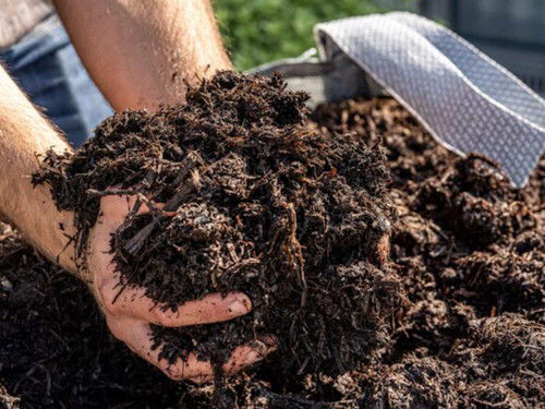 Bulk bag of spent mushroom compost for improving soil