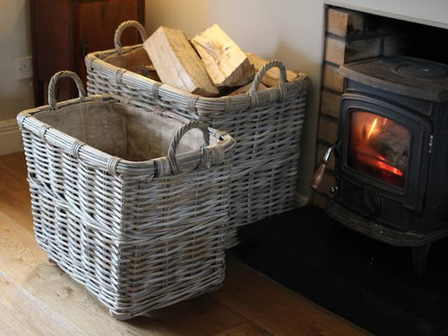 Large rectangular baskets on wheels with hessian liners